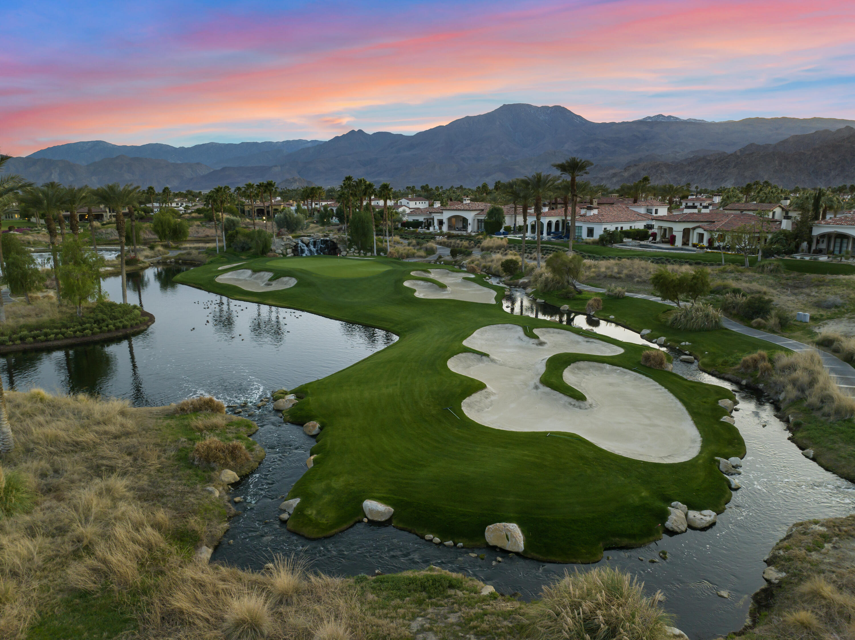 52844 Via Dona La Quinta, CA 92253 - Photo 44 of 46 a view of a lake with a mountain in the background