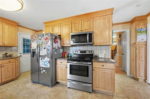 $455,995 | 6211 Oak Forest Court, Summerfield, NC 27358