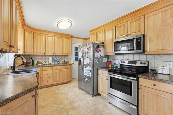 $455,995 | 6211 Oak Forest Court, Summerfield, NC 27358