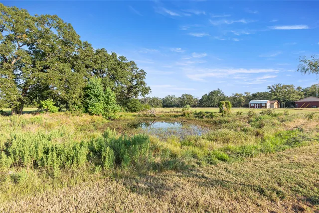 a view of a swimming pool with an ocean view