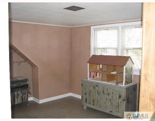 54 Coldevin Road Clark, NJ 07066 - Photo 5 of 8 a view of a balcony and wooden floor