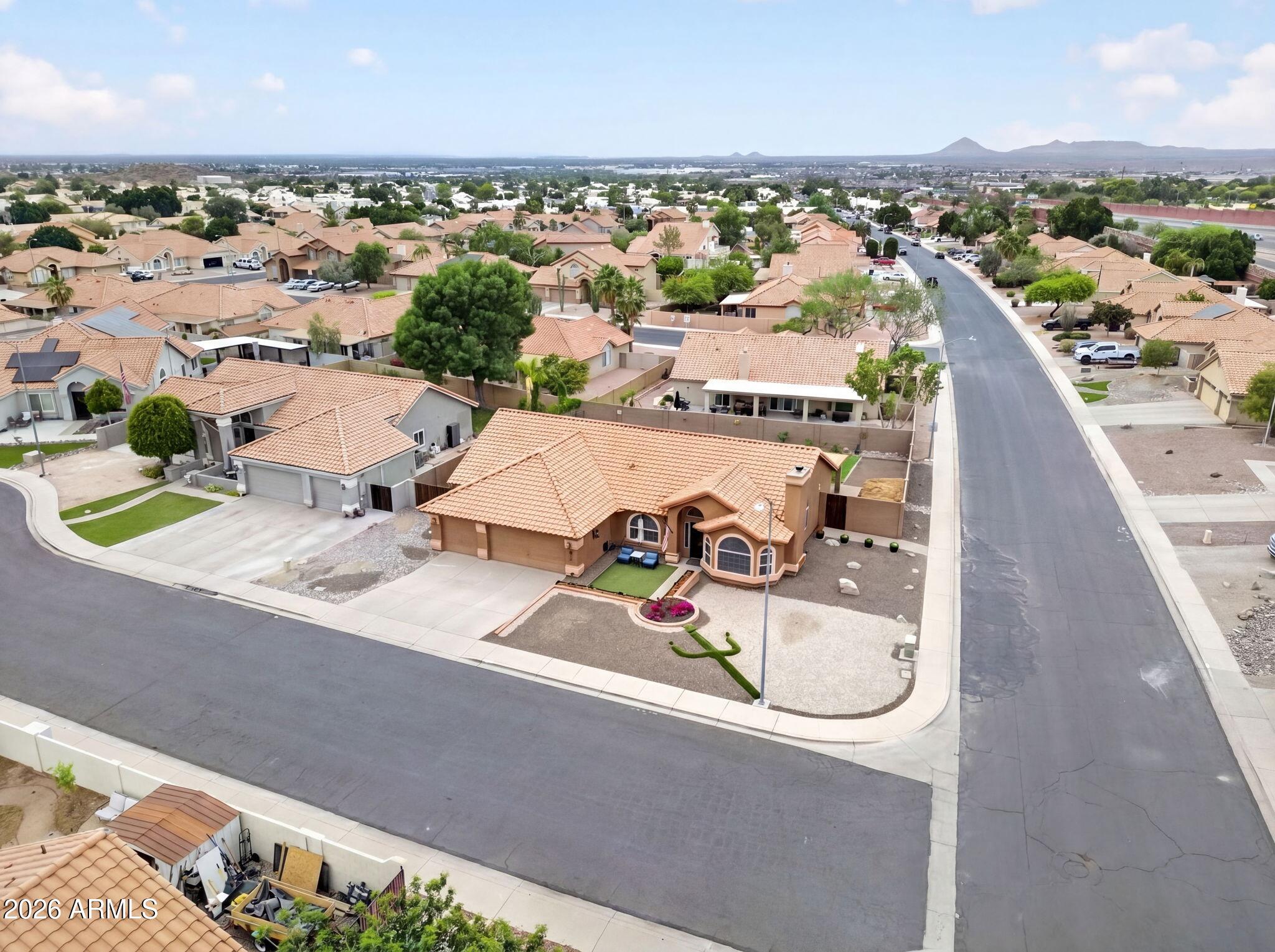 3242 North Ricardo Circle Mesa, AZ 85215 - Photo 59 of 79 an aerial view of a house with a swimming pool