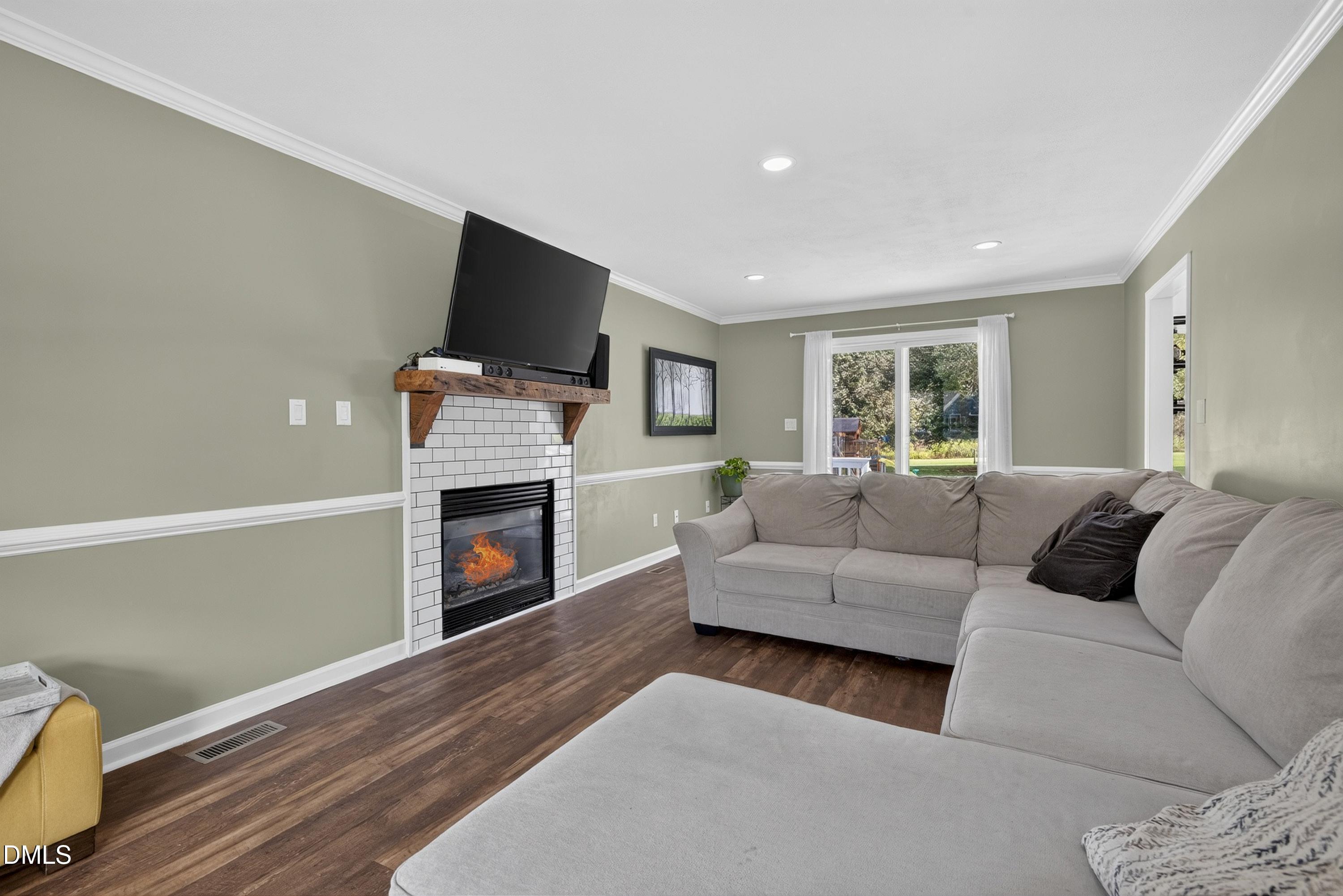 2020 Stonepond Lane Raleigh, NC 27603 - Photo 22 of 68 Fire in fireplace is virtually staged.