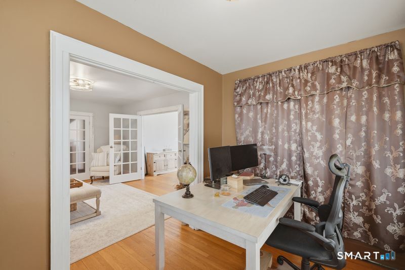 443 Highland Avenue Waterbury, CT 06708 - Photo 7 of 24 a view of a workspace with furniture