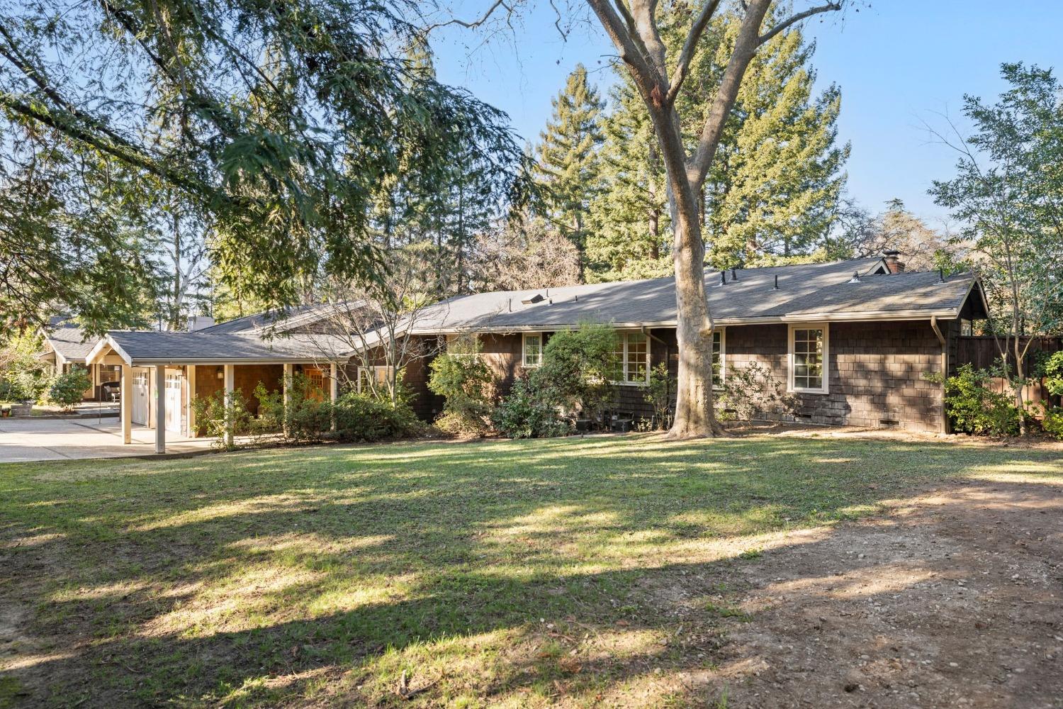 6609 Stanley Avenue Carmichael, CA 95608 - Photo 1 of 1 Nestled on over an acre of lush, mature landscaping, this stunning home offers a perfect blend of elegance and comfort. Plus, a charming ADU provides endless possibilities—guest quarters, home office, or rental income!
