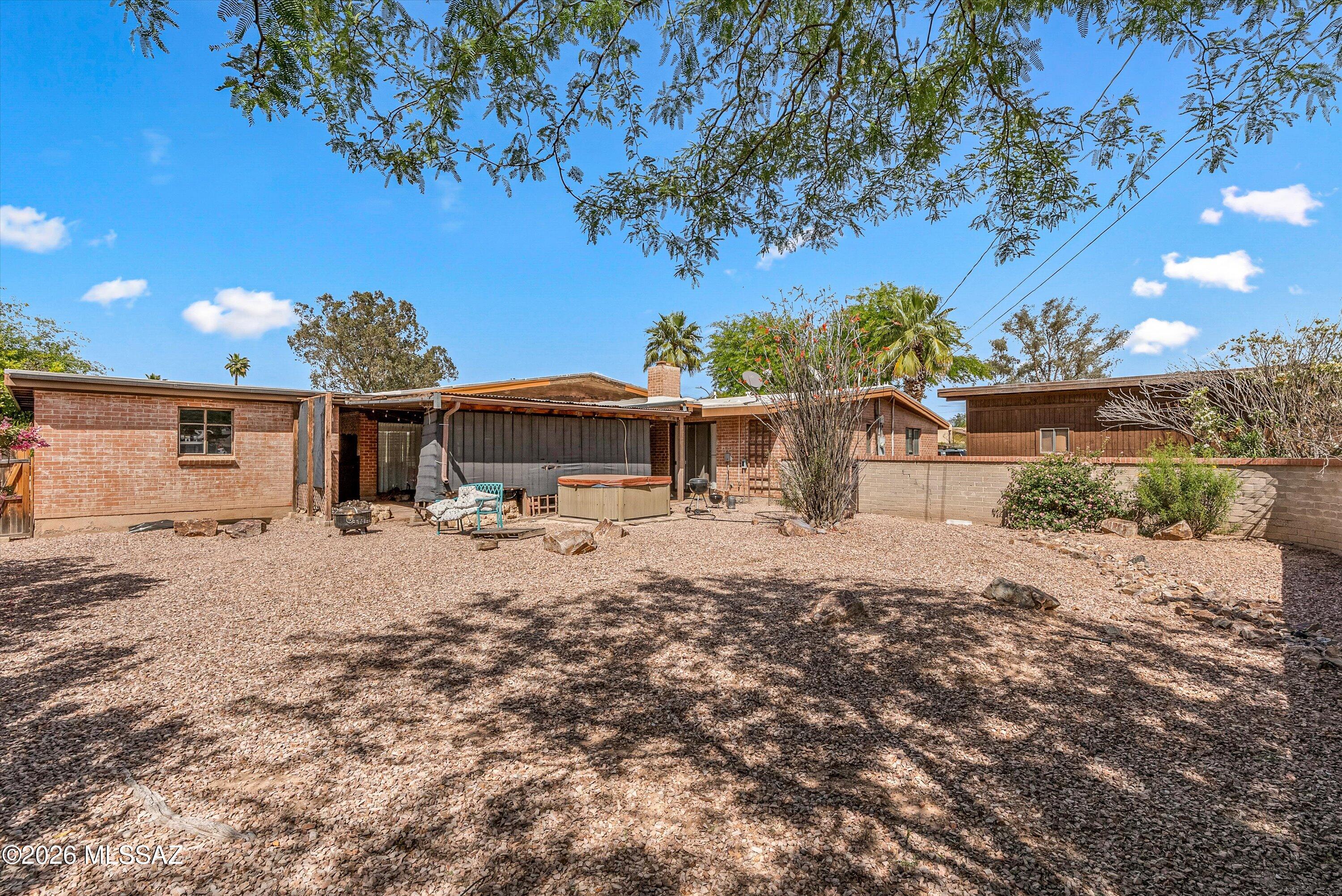 2934 East Exeter Street Tucson, AZ 85716 - Photo 13 of 20 a front view of a house with a yard