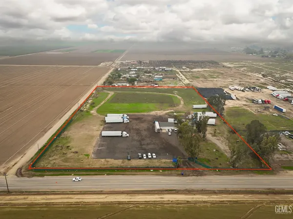a view of a swimming pool with an ocean view