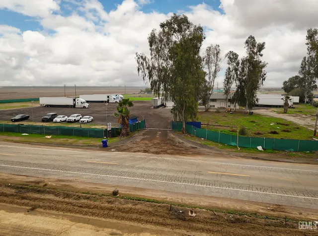 a view of a terrace with yard