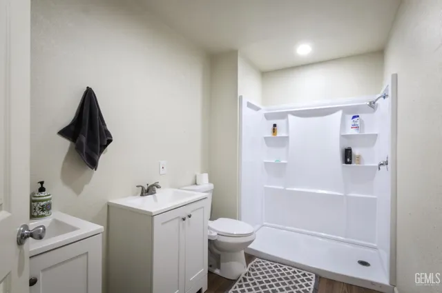 a view of staircase with white walls