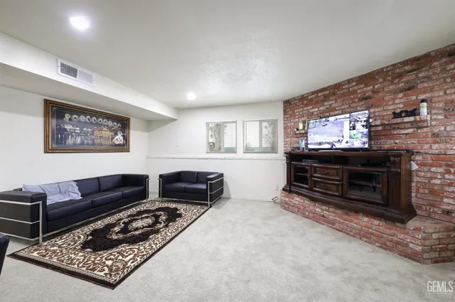 a view of parking garage with cars