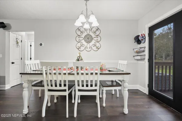 a view of a two chairs on the deck