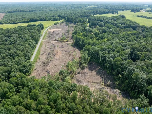 an aerial view of a houses with outdoor space