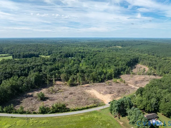 a view of a yard with swimming pool