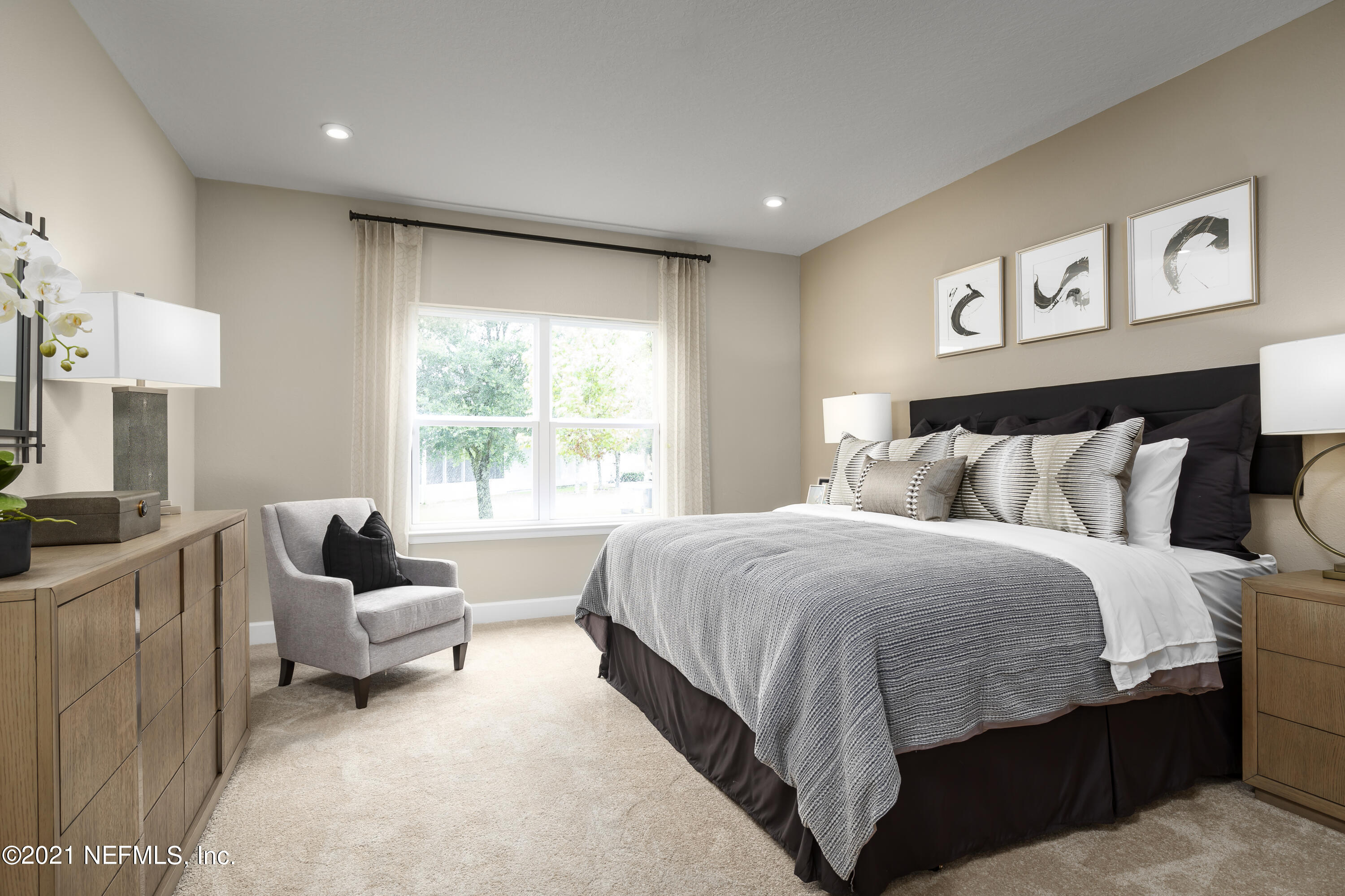 1339 Tan Tara Trail Jacksonville, FL 32221 - Photo 15 of 18 a bedroom with a bed and couch