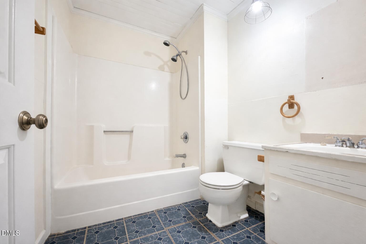 829 Shaw's Pond Road Four Oaks, NC 27524 - Photo 14 of 30 a bathroom with a toilet and a shower