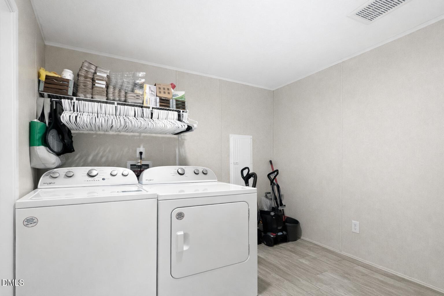 829 Shaw's Pond Road Four Oaks, NC 27524 - Photo 23 of 26 a utility room with dryer and washer