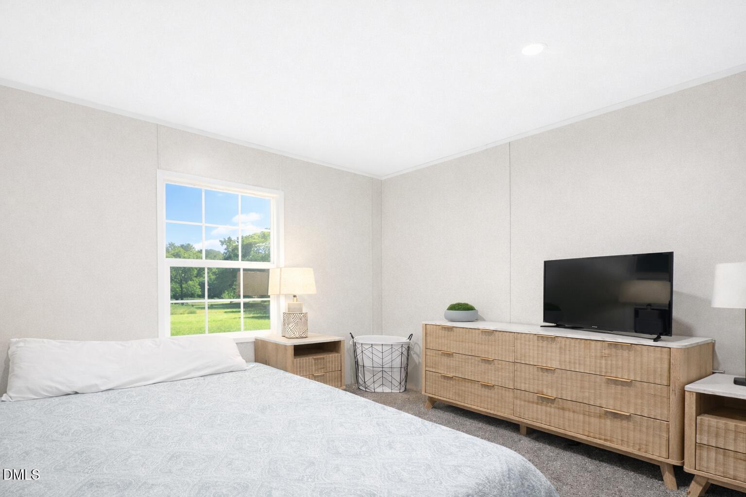 829 Shaw's Pond Road Four Oaks, NC 27524 - Photo 25 of 26 a bedroom with a bed and a flat screen tv