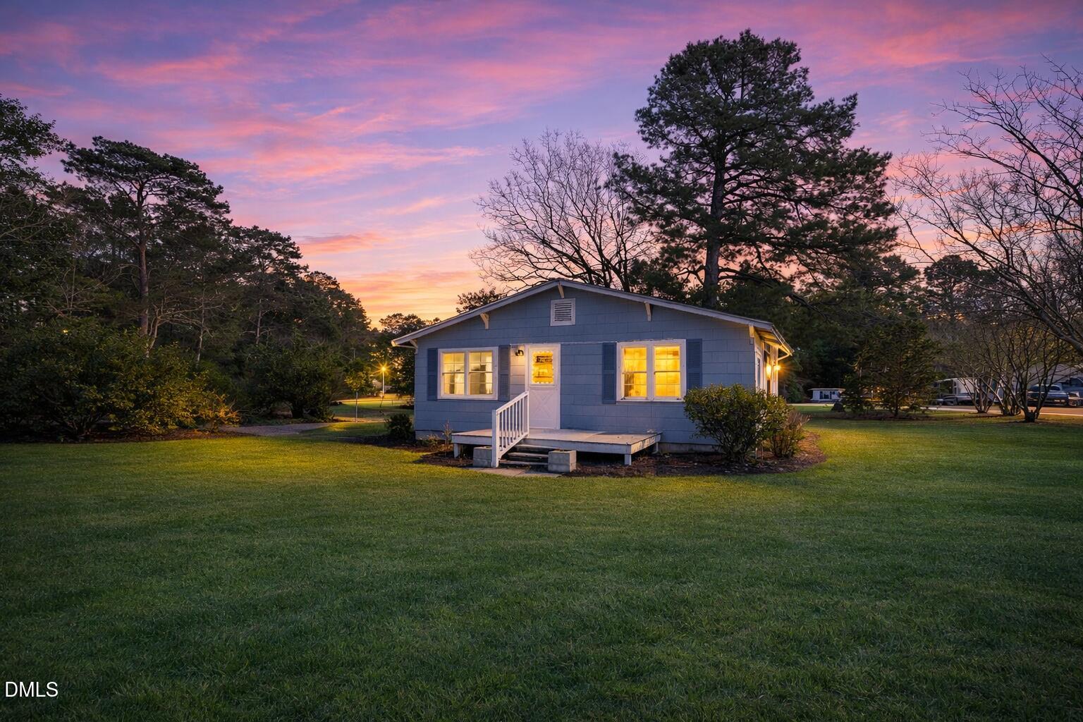 829 Shaw's Pond Road Four Oaks, NC 27524 - Photo 3 of 30 a view of a house with a yard