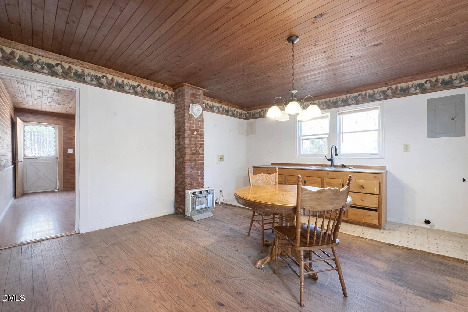 829 Shaw's Pond Road Four Oaks, NC 27524 - Photo 9 of 26 a dining room with furniture and window