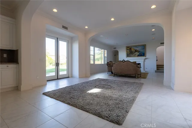 a living room with a couch and a window