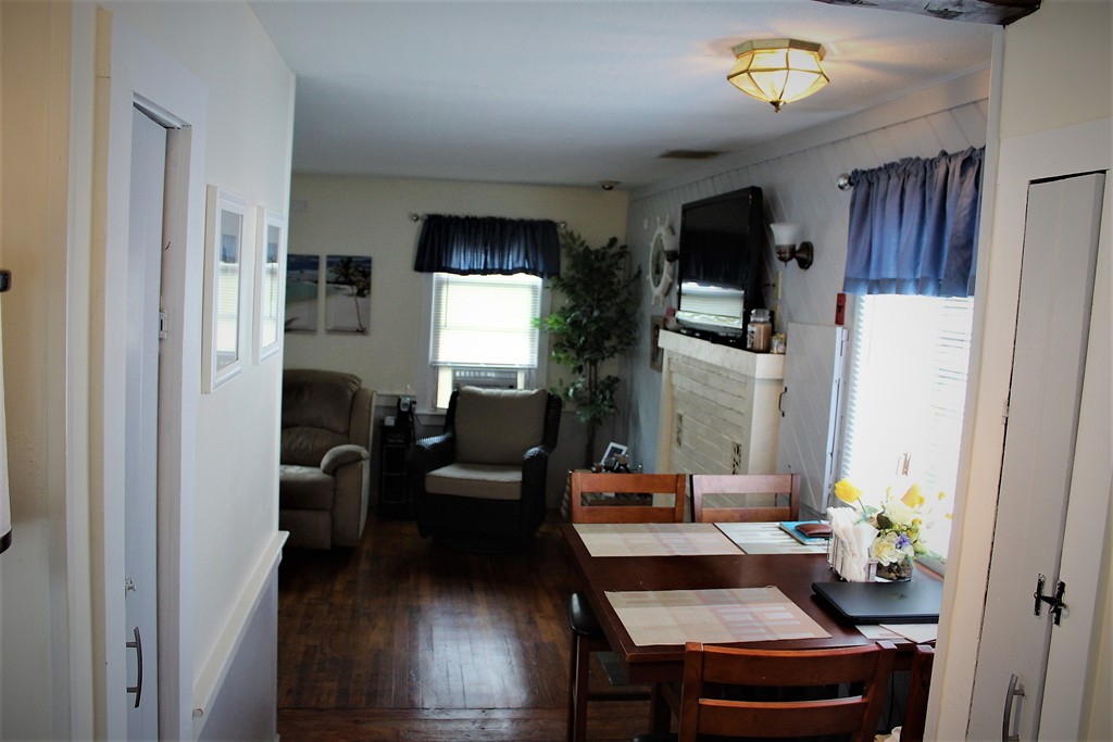 6 Short Neck Road Wareham, MA 02532 - Photo 8 of 17 a living room with furniture and a fireplace
