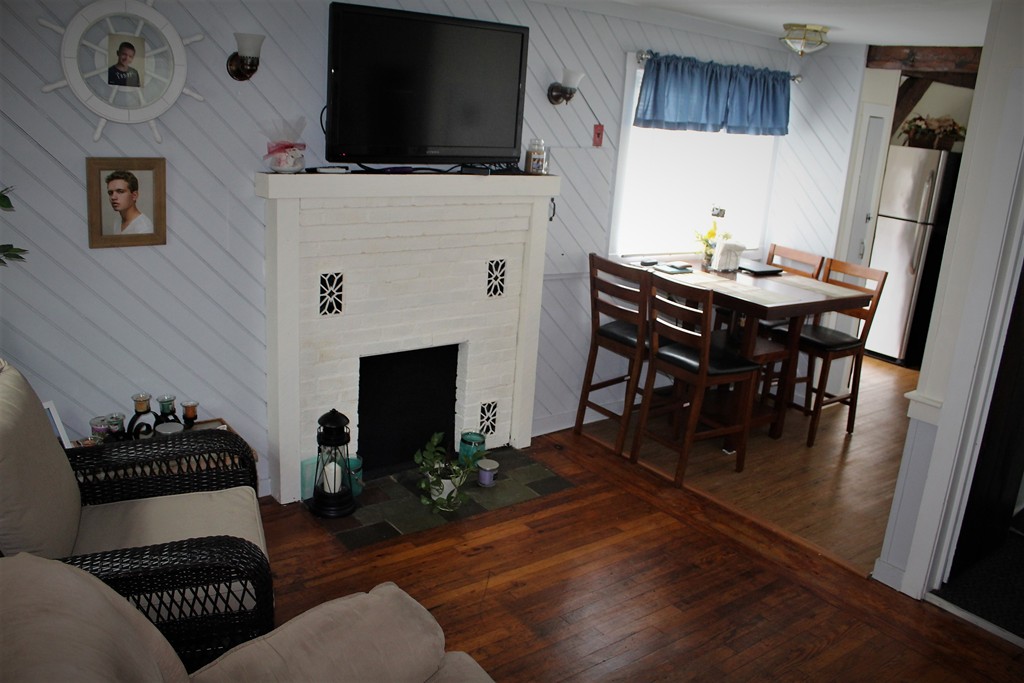 6 Short Neck Road Wareham, MA 02532 - Photo 9 of 17 a living room with furniture and a flat screen tv