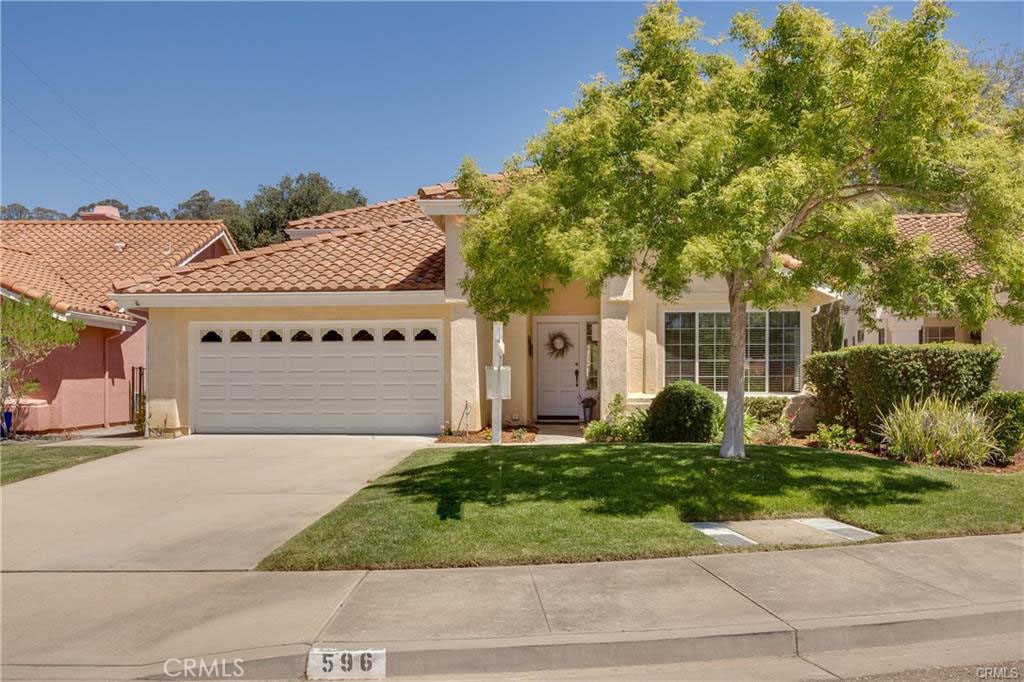 596 Masters Circle Nipomo, CA 93444 - Photo 1 of 13 front view of a house with a yard