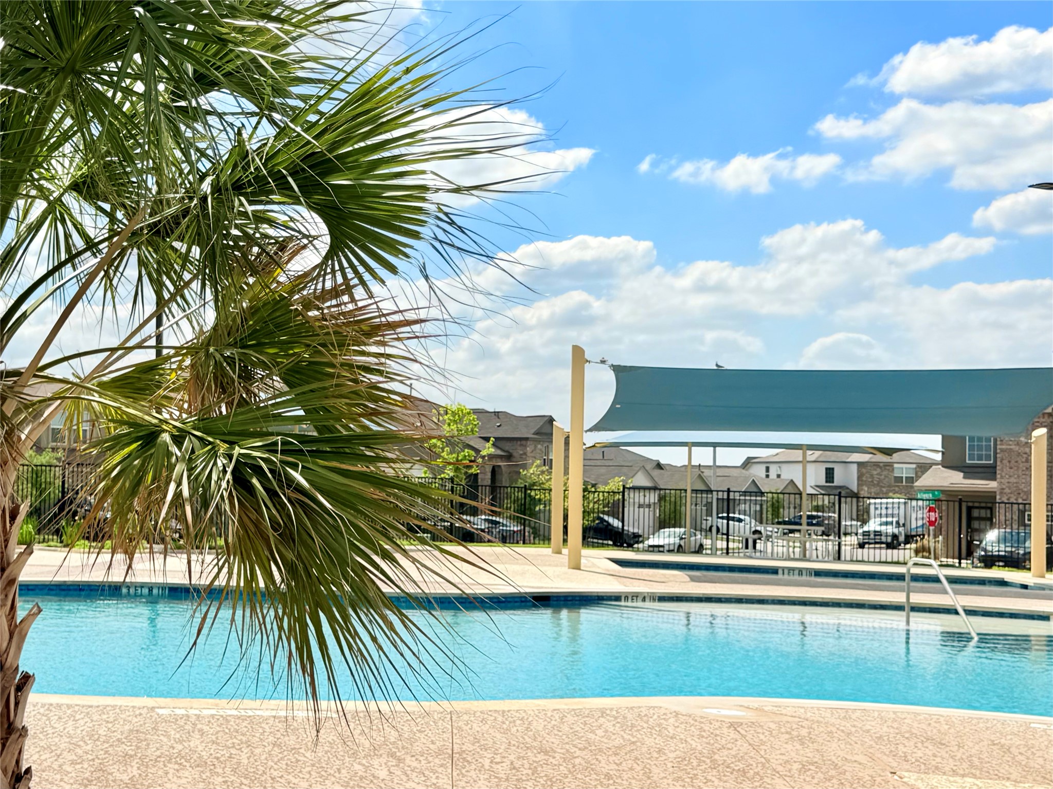 305 Milliner Loop Hutto, TX 78634 - Photo 36 of 36 a view of a swimming pool and a chair