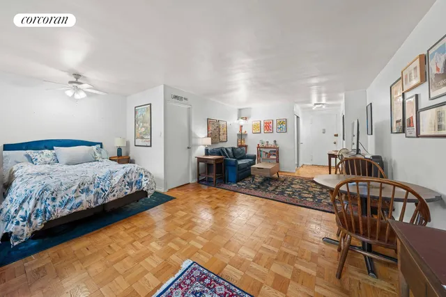 a living room with furniture and a rug