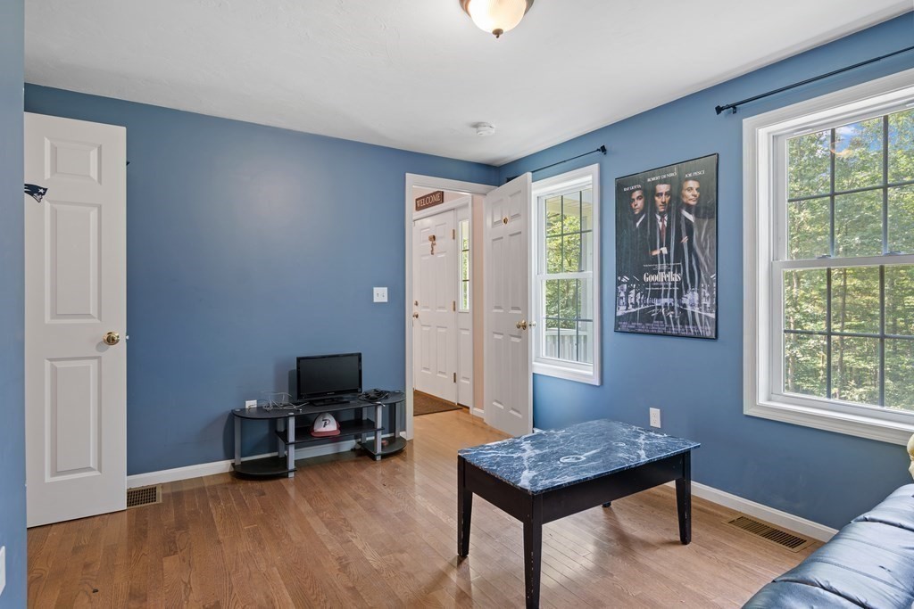 299 Allen Road Ashby, MA 01431 - Photo 18 of 26 a livingroom with workspace and a window