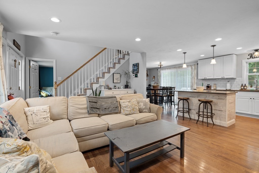 299 Allen Road Ashby, MA 01431 - Photo 6 of 26 a living room with furniture and kitchen view