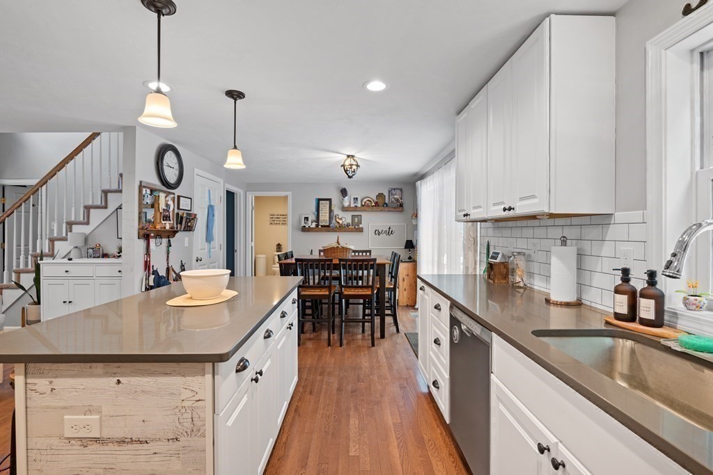 299 Allen Road Ashby, MA 01431 - Photo 10 of 26 a kitchen with granite countertop a sink a counter space appliances and cabinets