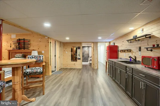 a bed room with a bed and a chair