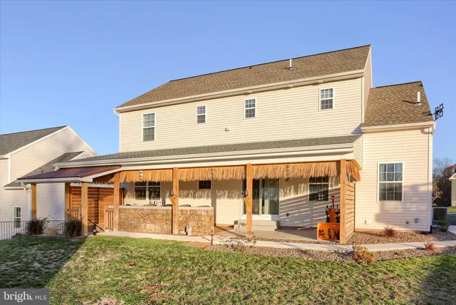 a view of an chairs and table in the balcony