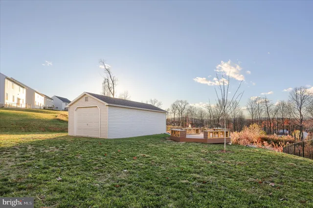 an aerial view of a house with outdoor space