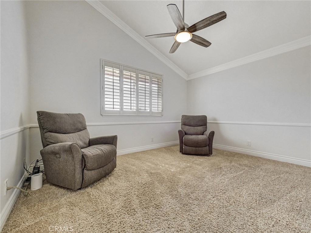 5831 Moonstone Avenue Rancho Cucamonga, CA 91701 - Photo 39 of 61 a living room with furniture and a window