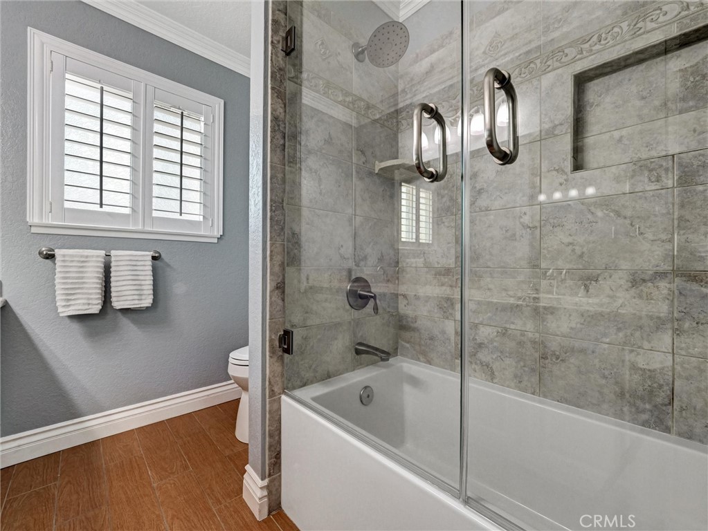 5831 Moonstone Avenue Rancho Cucamonga, CA 91701 - Photo 42 of 61 a bath tub sitting next to a window