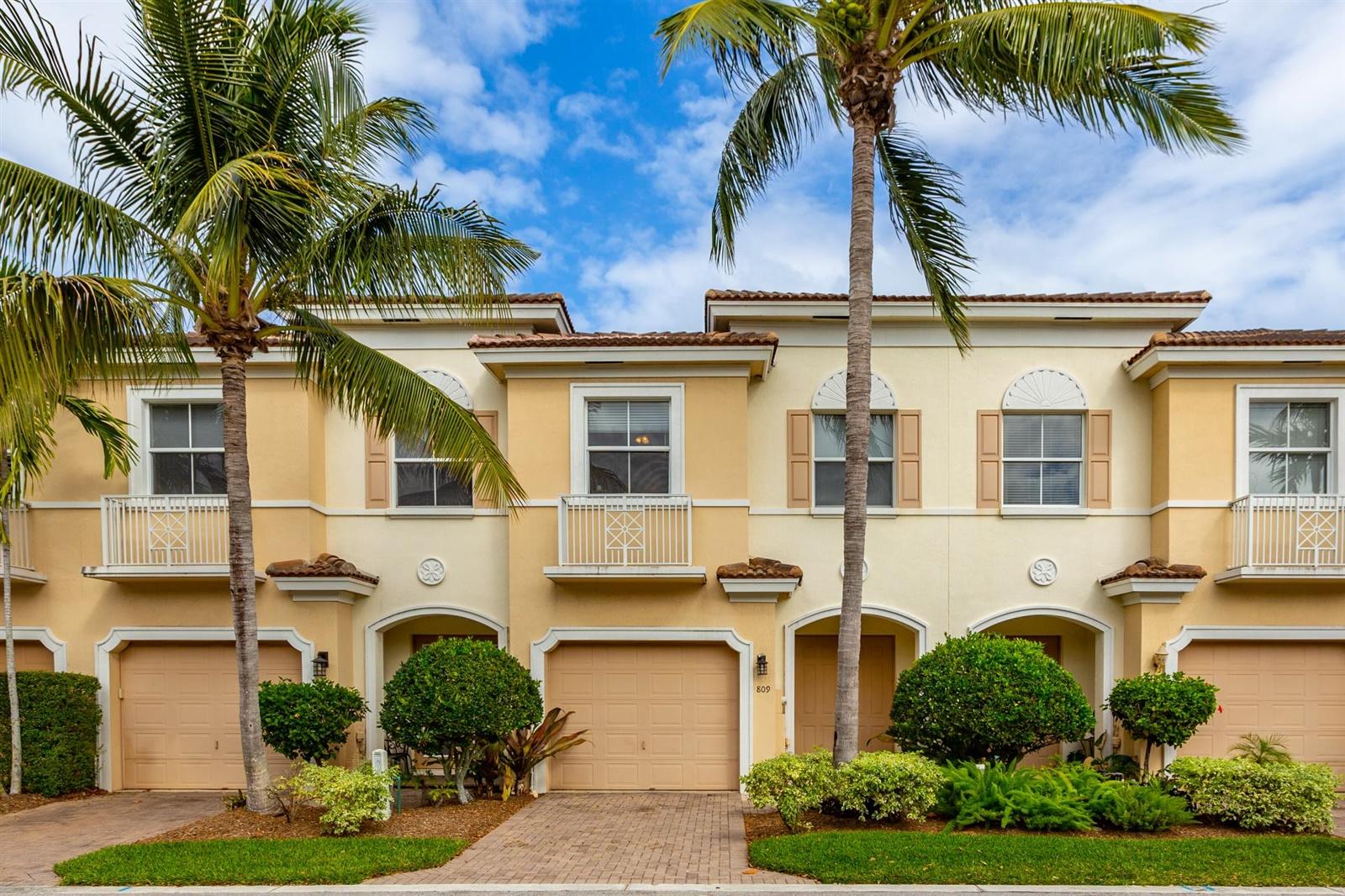 1000 North Us Highway, Unit 809 Jupiter, FL 33477 - Photo 26 of 30 front view of house with a palm plants