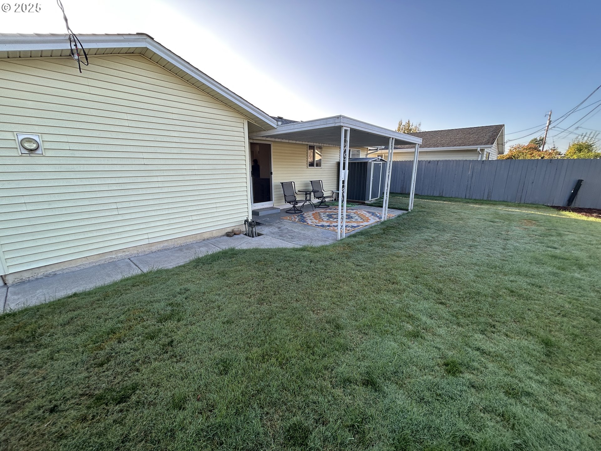 1753 Jansen Way Woodburn, OR 97071 - Photo 13 of 17 a view of a house with backyard and porch