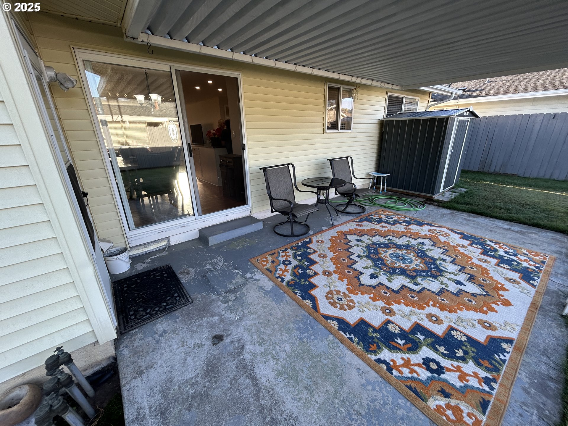 1753 Jansen Way Woodburn, OR 97071 - Photo 14 of 17 a view of a porch with furniture