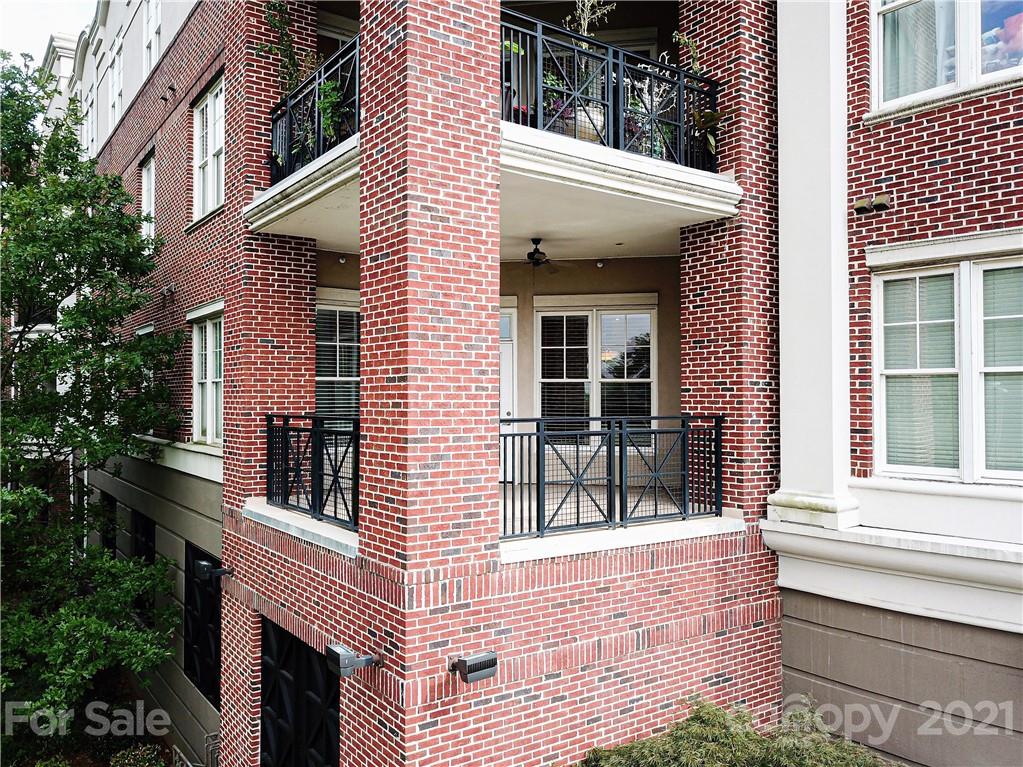 5425 Closeburn Road, Unit 103 Charlotte, NC 28210 - Photo 34 of 39 a view of house with outdoor space and porch