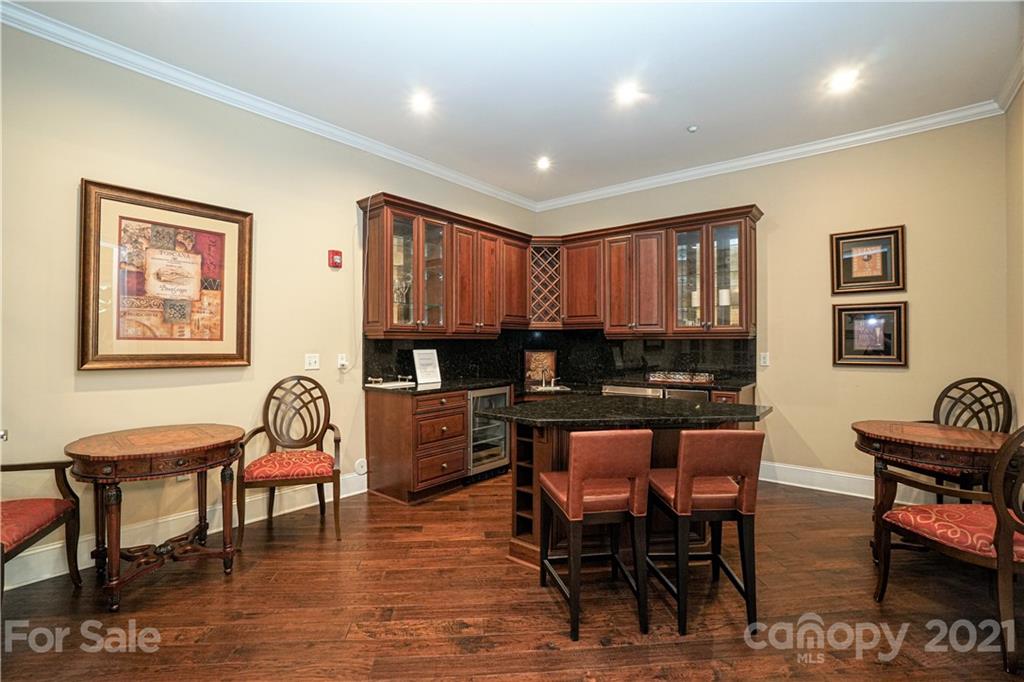 5425 Closeburn Road, Unit 103 Charlotte, NC 28210 - Photo 38 of 39 a view of a dining room with furniture