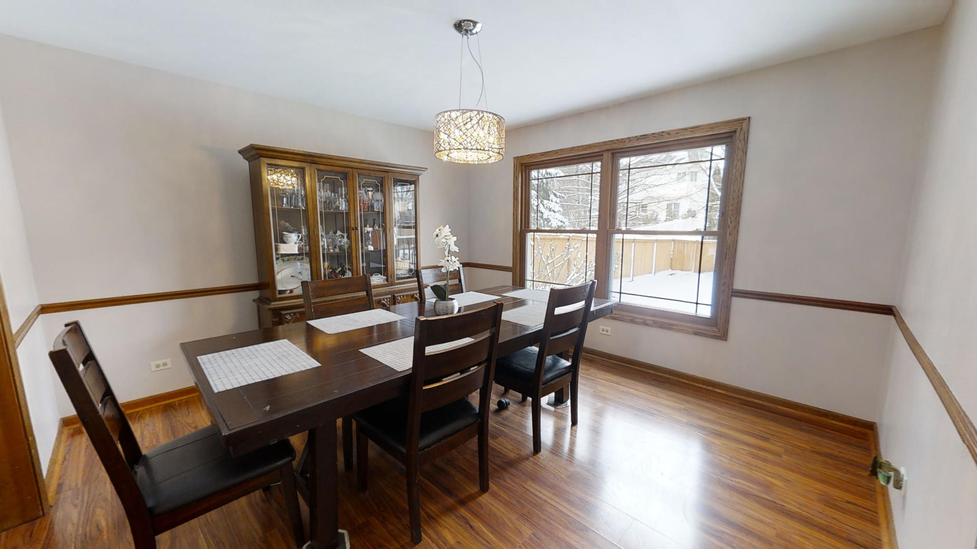 1948 Slippery Rock Road Naperville, IL 60565 - Photo 14 of 61 a view of a dining room with furniture window and wooden floor