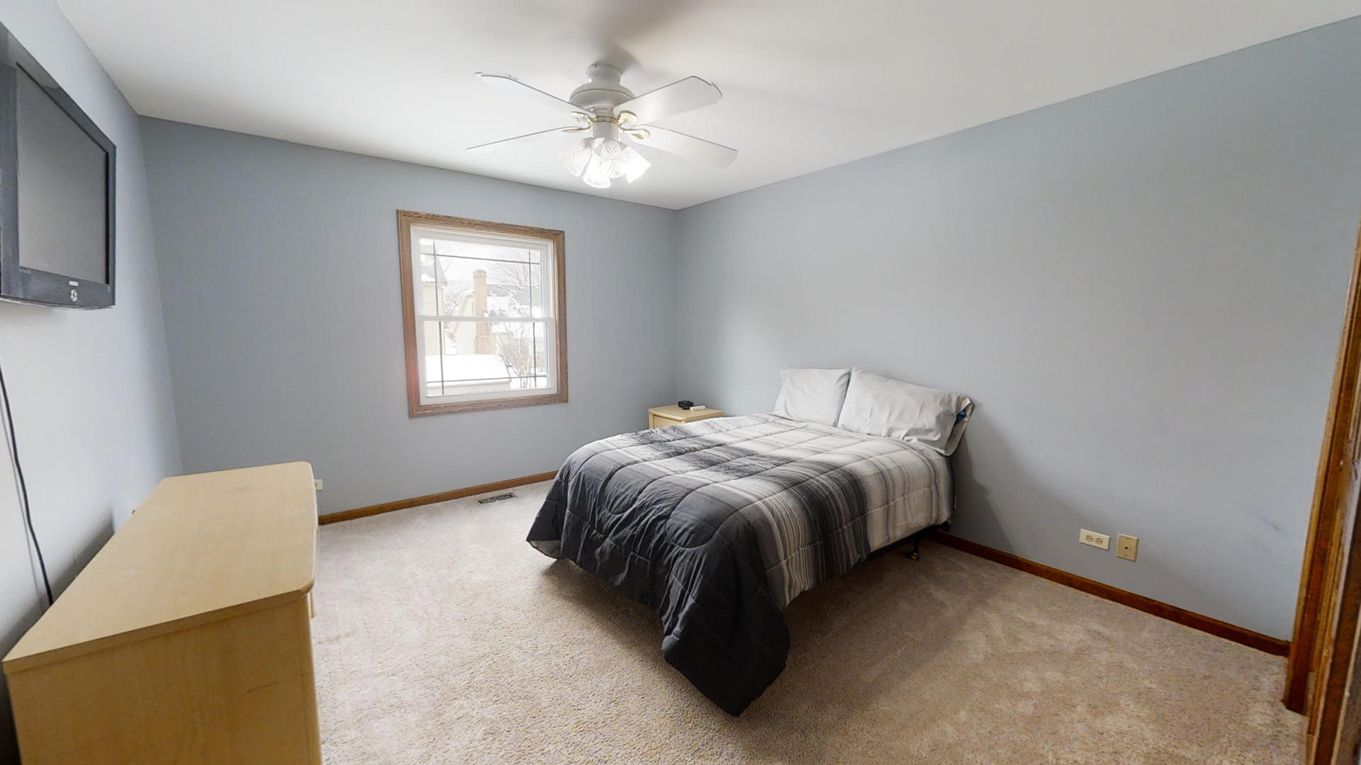 1948 Slippery Rock Road Naperville, IL 60565 - Photo 41 of 61 a spacious bedroom with a bed and a chandelier