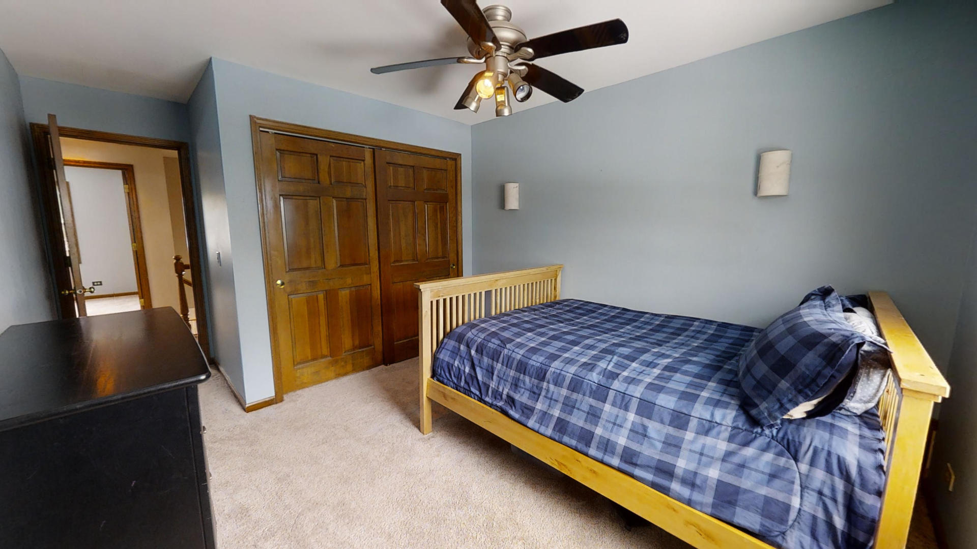 1948 Slippery Rock Road Naperville, IL 60565 - Photo 44 of 61 a bedroom with a bed and a chandelier