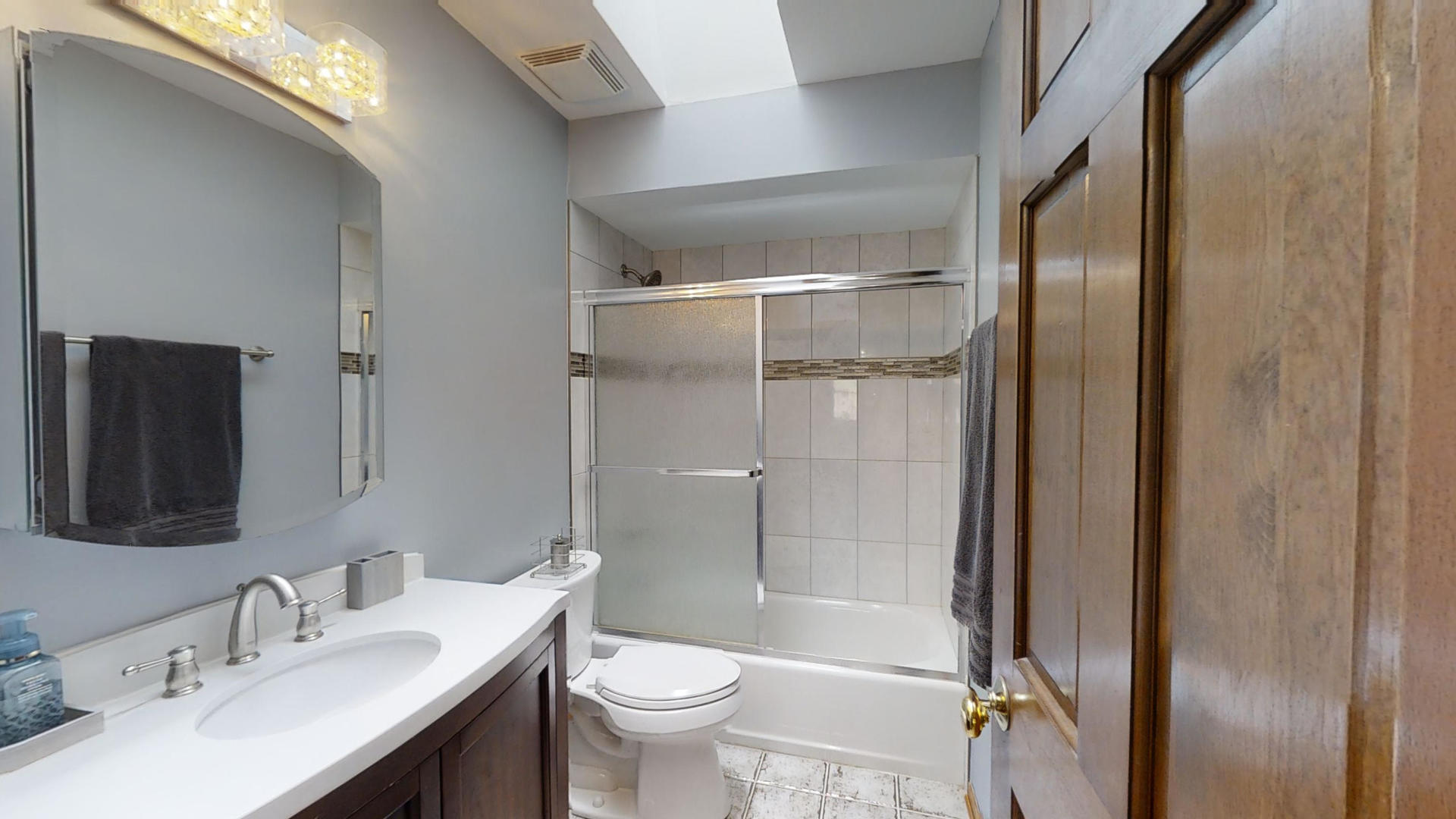 1948 Slippery Rock Road Naperville, IL 60565 - Photo 45 of 61 a bathroom with a sink toilet and shower