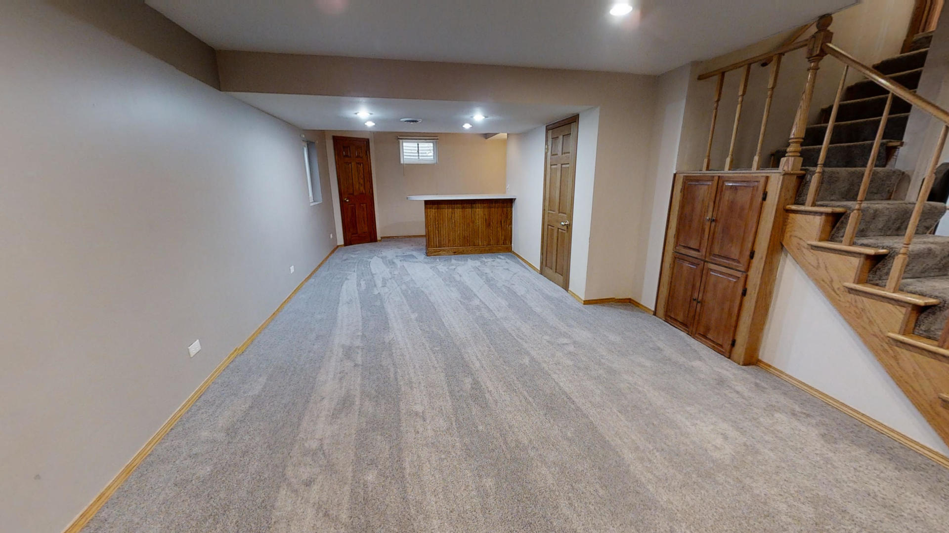 1948 Slippery Rock Road Naperville, IL 60565 - Photo 48 of 61 a view of empty room with wooden floor and staircase