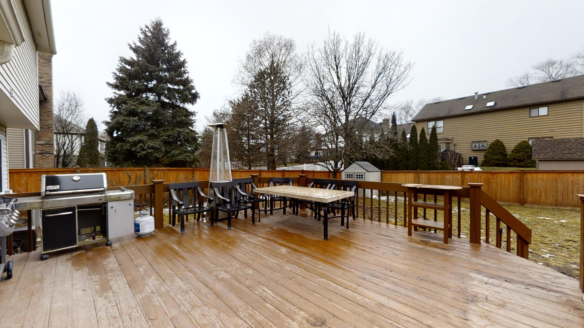 1948 Slippery Rock Road Naperville, IL 60565 - Photo 56 of 61 a roof deck with table and chairs a barbeque with wooden floor and fence