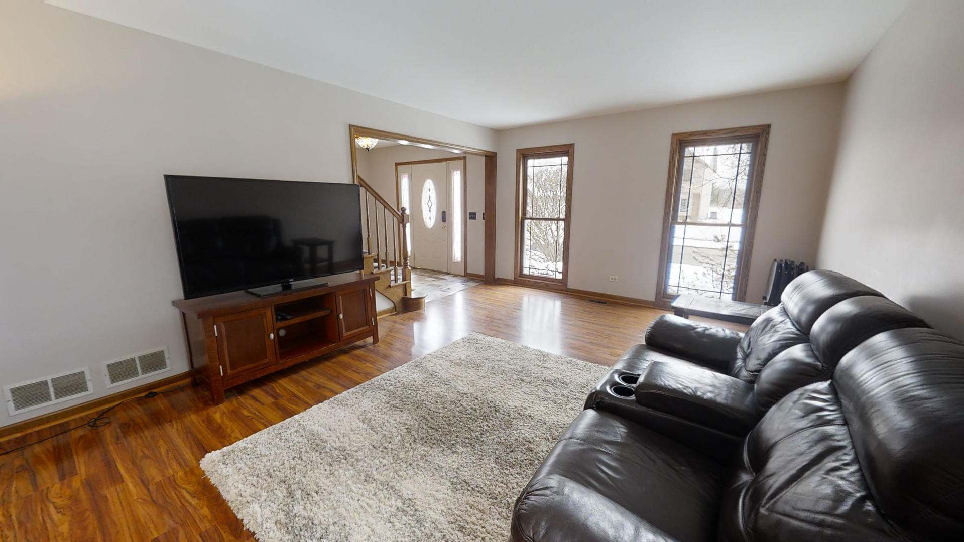 1948 Slippery Rock Road Naperville, IL 60565 - Photo 10 of 61 a living room with furniture and a flat screen tv