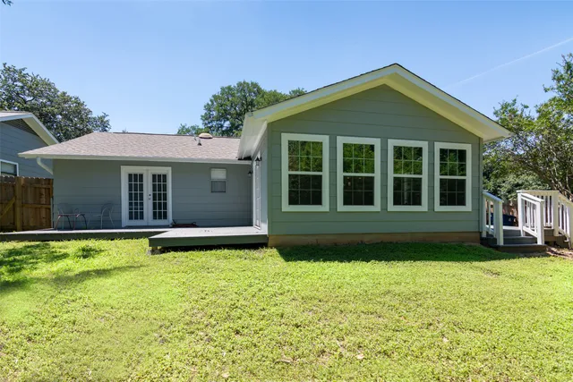 a house view with a garden space